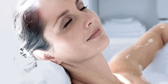 Woman enjoying a bath