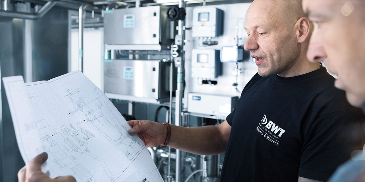 BWT technician explaining water purifier